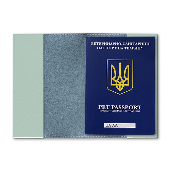Обкладинка на міжнародний ветпаспорт із породами собак